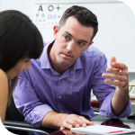 Image of a doctor talking to a patient